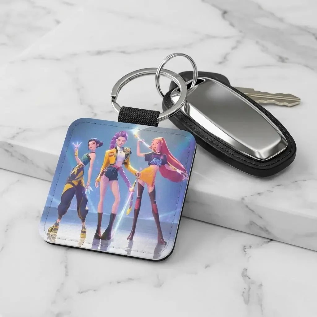 Custom Keychain with colorful KDH character design on a marble surface
